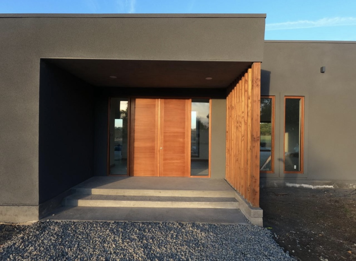 Grey spray cork finish on a modern house