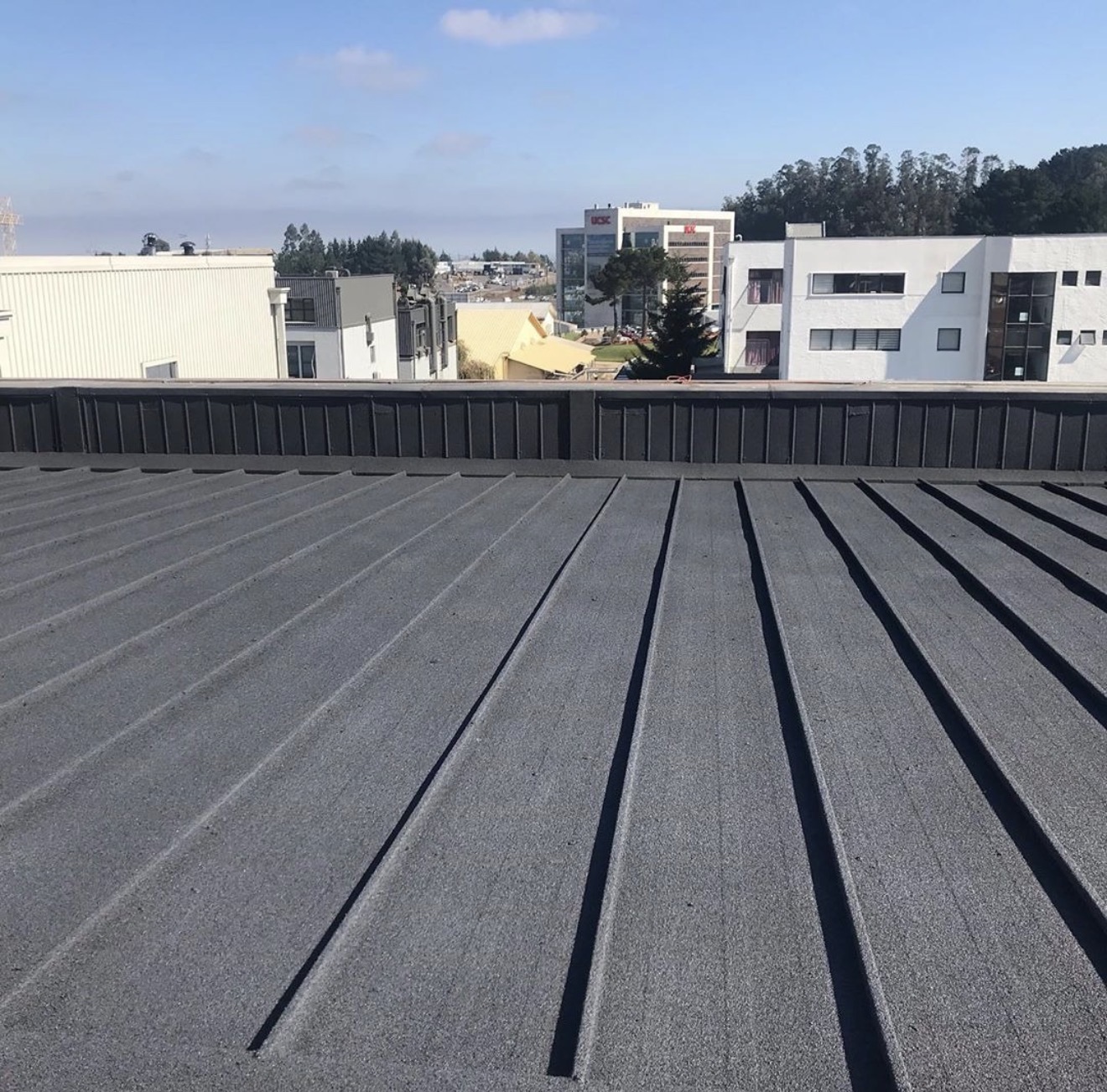 Finished grey spray cork roof coating
